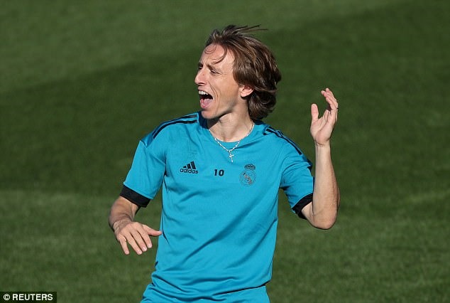 Modric háo hức được gặp lại đội bóng cũ. Ảnh: Reuters.
