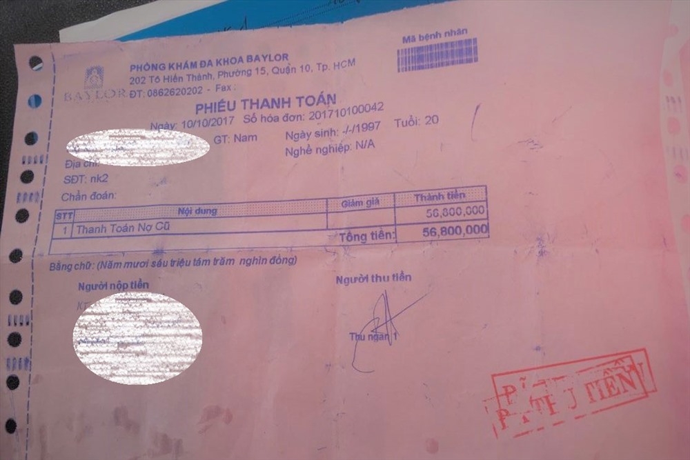 Giấy ghi nợ 56,8 triệu đồng do Phòng khám Đa khoa Bayler viết cho anh H. Ảnh: K.Q