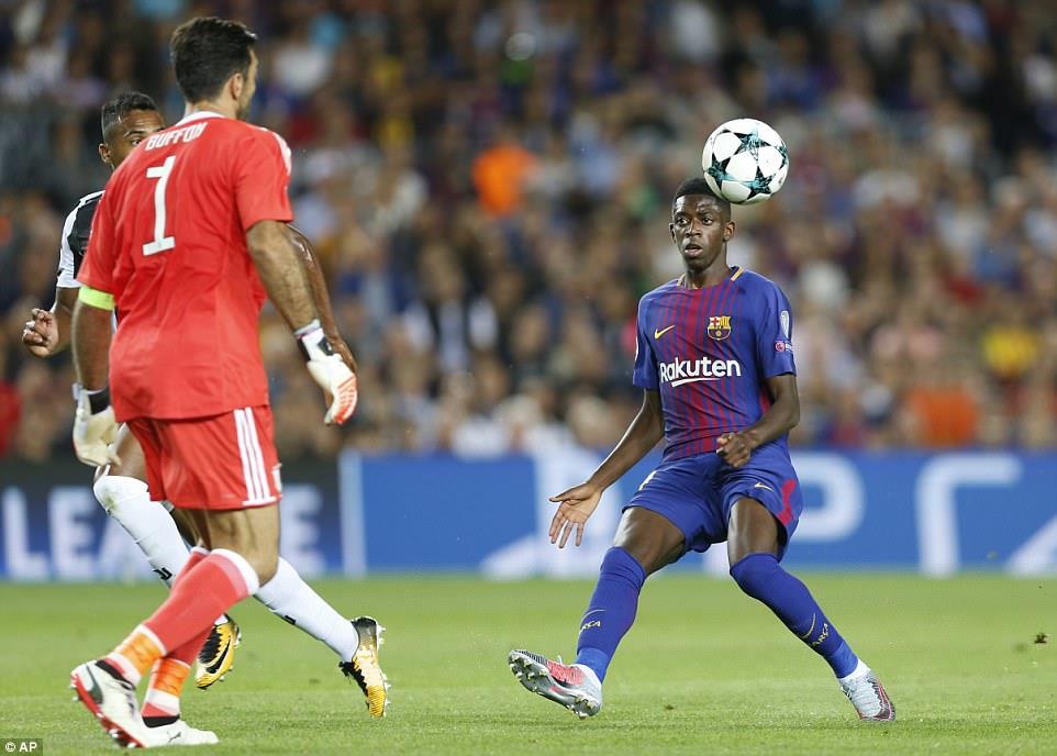 Ousmane Dembele đang từng bước hòa nhập với lối chơi ở đội bóng mới. Ảnh: AP.