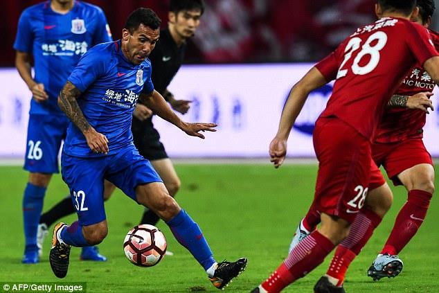 Tevez đang chán ghét bóng đá Trung Quốc và ngược lại. Ảnh: Getty.
