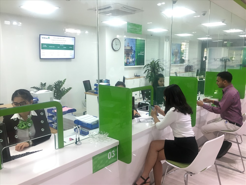 Vietcombank khai trương ngân hàng 100% vốn nước ngoài tại Lào ...