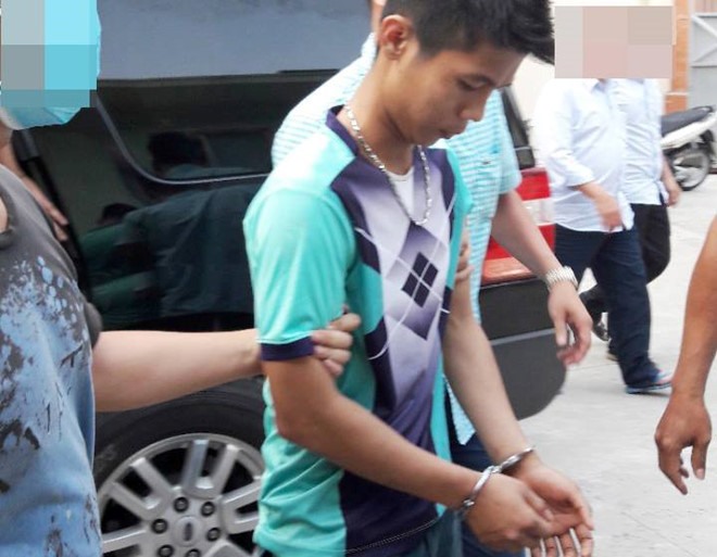 Nghi phạm được dẫn giải về phục vụ điều tra. Ảnh: CTV.