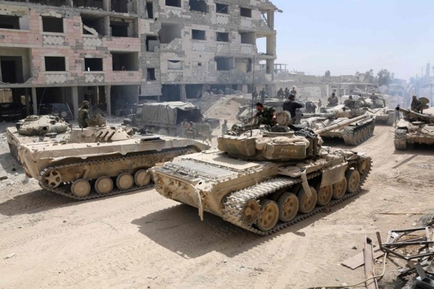 Quân đội Syria tập kết ở Douma ngày 8.4.2018. Ảnh: AFP