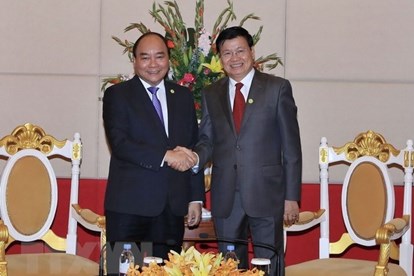 Thủ tướng đề nghị Lào thúc đẩy đơn giản hóa thủ tục cho lao động Việt Nam 