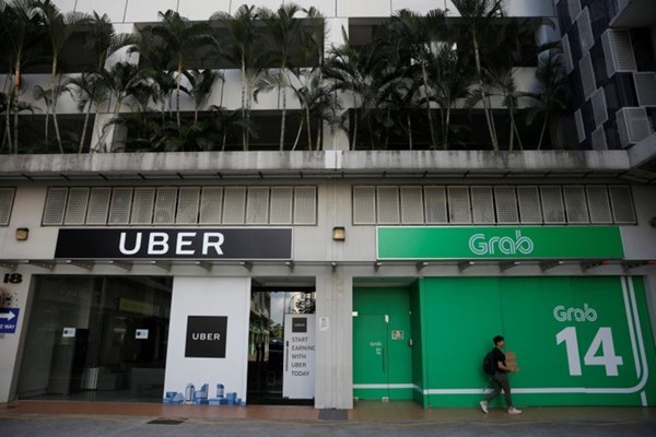 Singapore hoàn tất điều tra và không huỷ bỏ thương vụ Grab mua Uber