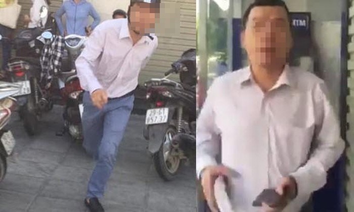 Anh T hành hung một phụ nữ vì bị nhắc nhở xếp hàng khi rút tiền. Ảnh: C.L