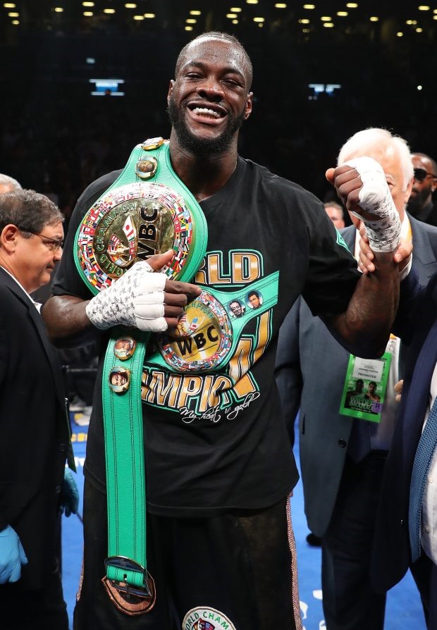 Deontay Wilder hiện đang giữ đai WBC. Ảnh: AP