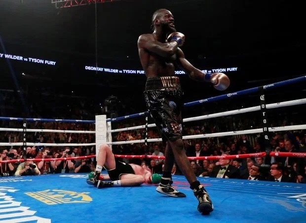 Deontay Wilder như biến thành con người khác khi lên sàn đấu. Ảnh: Reuters