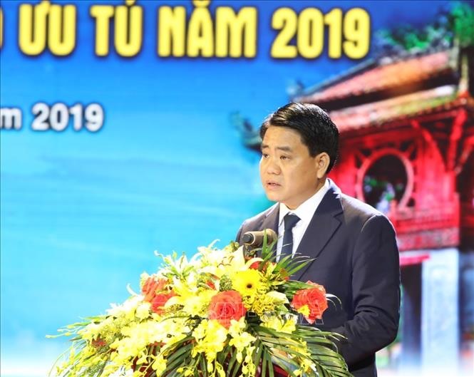 Ông Nguyễn Đức Chung, Uỷ viên Trung ương Đảng, Phó Bí thư Thành ủy, Chủ tịch Ủy ban nhân dân, Chủ tịch Hội đồng Thi đua-Khen thưởng thành phố Hà Nội phát biểu. Ảnh: Văn Điệp/TTXVN