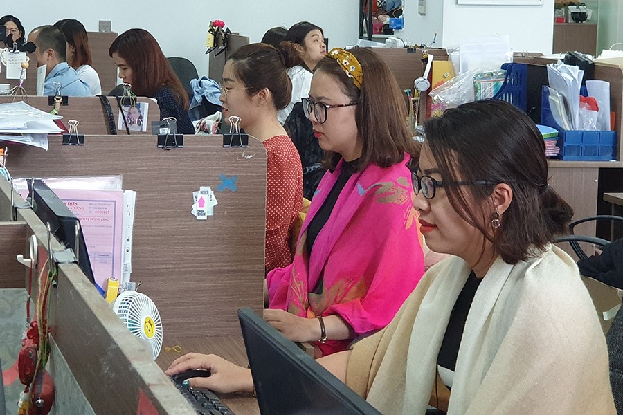 Nhân viên Văn phòng Cty Global Fashion được chọn giờ làm việc buổi sáng bắt đầu từ 8 - 9h. Ảnh: NAM DƯƠNG
