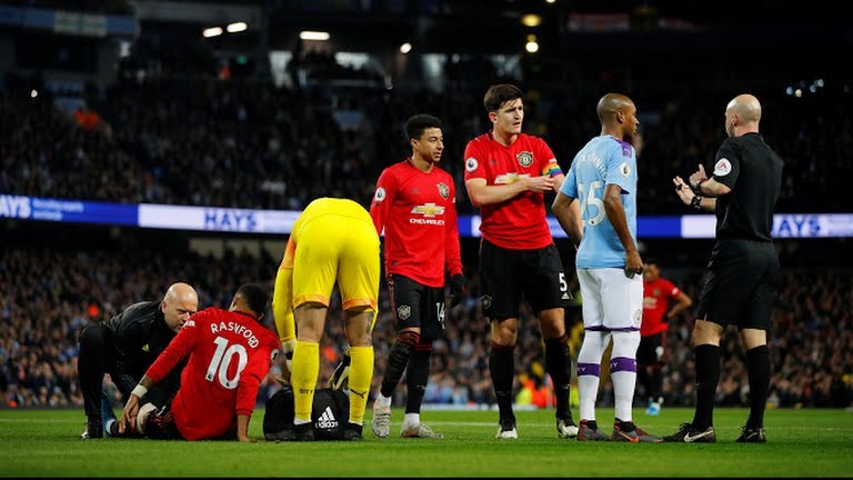 Tình huống mở điểm của Rashford. Ảnh: Getty & Reuters.