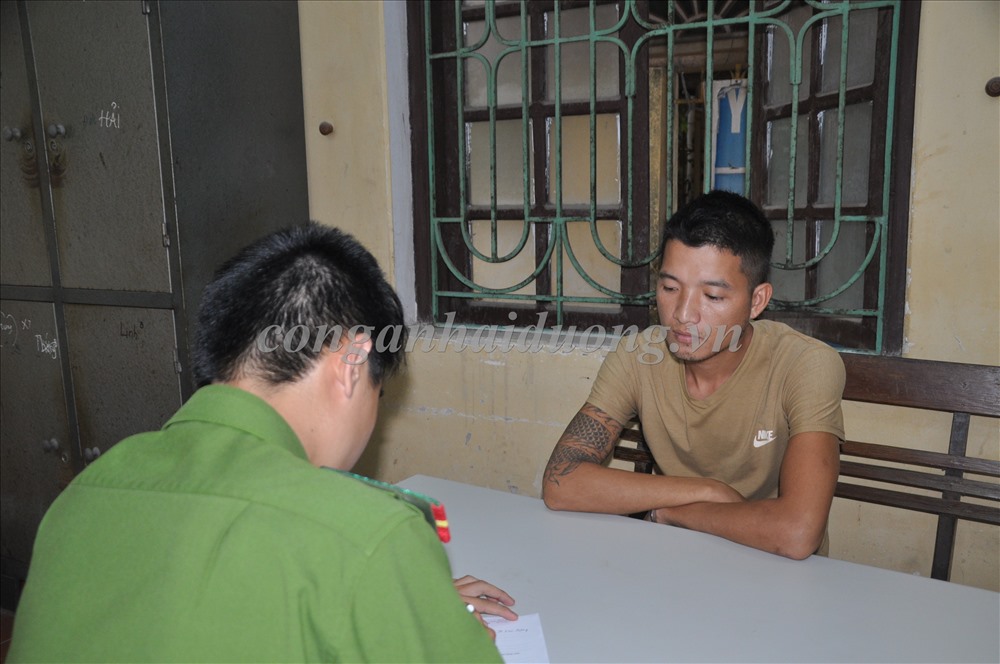 Đối tượng Phạm Như Toàn tại cơ quan công an.