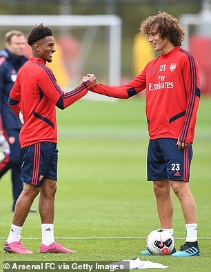 David Luiz có buổi tập đầu tiên cùng những người đồng đội mới như Reiss Nelson hay Henrik Mkhitarian (dưới). Ảnh: Getty.