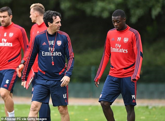 HLV Emery và cầu thủ Châu Phi đắt giá nhất lịch sử - Nicolas Pepe. Ảnh: Getty.
