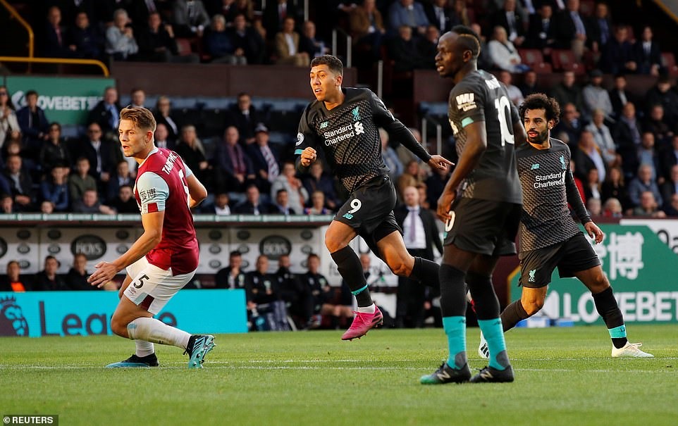 Firmino (số 9) ghi bàn ấn định tỷ số 3-0. Ảnh: Reuters.