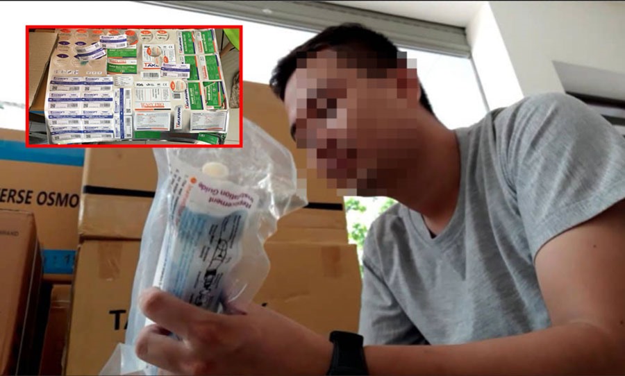 Ông chủ cơ sở phân phối máy lọc nước hướng dẫn cách dán tem made in USA lên màng lọc nước RO Trung Quốc. Ảnh TK