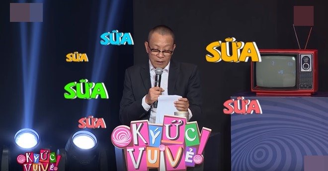 MC Lại Văn Sâm đọc câu hỏi: ”Lon Sữa Guigoz trước khi tái sử dụng nhiều lần dùng để đựng gì?”