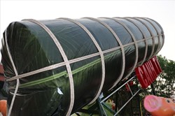 Bí mật bên trong đòn bánh tét "khổng lồ" sẽ đãi người nghèo ăn Tết