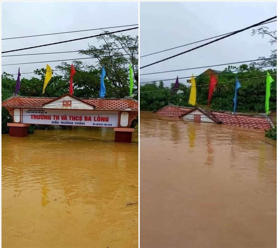 Mặc dù đã tổ chức dọn dẹp về sinh nhưng những ngày qua, lũ lại dâng lên khiến toàn cổng chào, tầng 1 của trường học Ba Lòng chìm trong biển nước. Ảnh: CTV