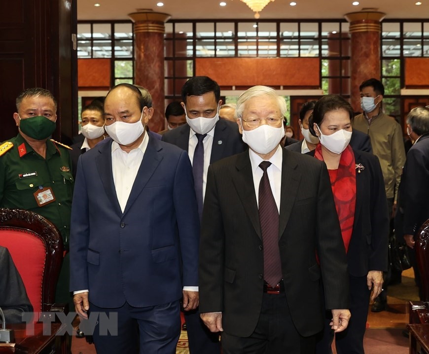 Tổng Bí thư, Chủ tịch nước Nguyễn Phú Trọng, Thủ tướng Chính phủ Nguyễn Xuân Phúc, Chủ tịch Quốc hội Nguyễn Thị Kim Ngân đến dự Hội nghị. (Ảnh: Trí Dũng/TTXVN)