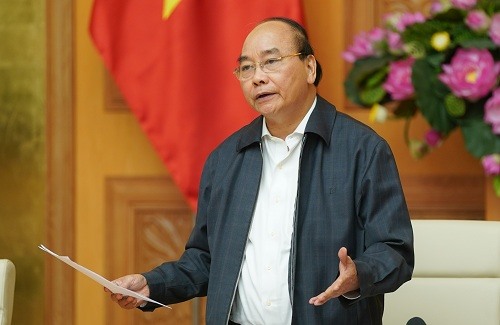 Thủ tướng Nguyễn Xuân Phúc phát biểu tại cuộc họp. Ảnh: VGP/Quang Hiếu