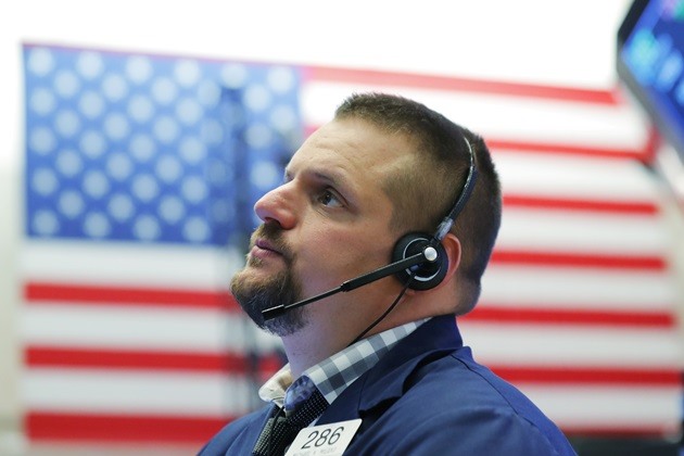 Dow Jones lao dốc hơn 12% do lo ngại dịch COVID-19 bùng phát. Ảnh TL