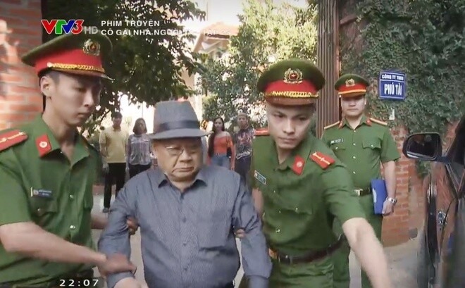 Ông Tài bị công an bắt. Ảnh cắt từ clip