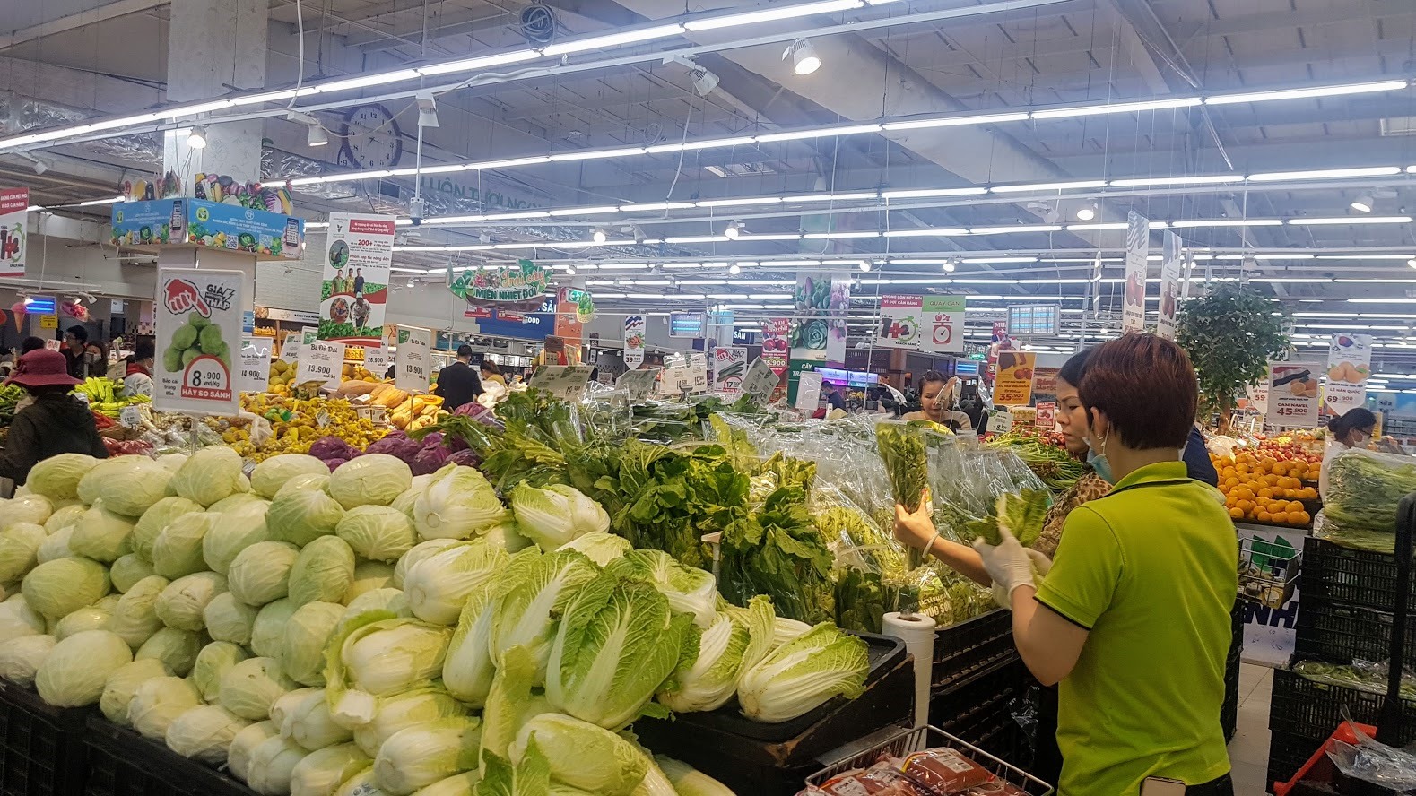 Theo Chủ tịch VCCI Vũ Tiến Lộc, “sống chung với COVID-19” là phương thức kinh doanh trong thời đại dịch. Ảnh: KH.V