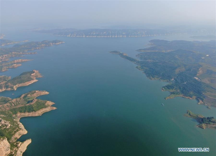 Hồ chứaTiểu Long Để rộng 12,8km3, trải dài 130km. Hồ được thiết kế để chứa trầm tích trong 20 năm đầu vận hành sau đó đạt trạng thái cân bằng. Ảnh: Tân Hoa Xã.