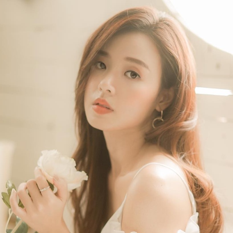 Midu là giảng viên 1 trường đại học. Ảnh: NSCC
