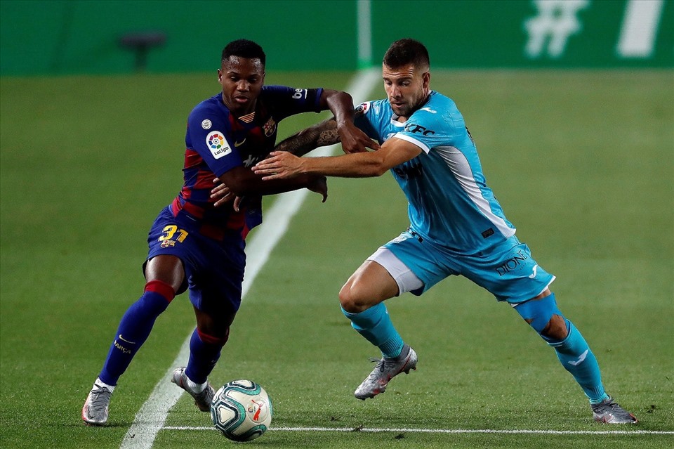 Nếu Fati (trái) gia hạn với Barca, Manchester United sẽ mất 360 triệu bảng để giải phóng hợp đồng. Ảnh: Getty Images
