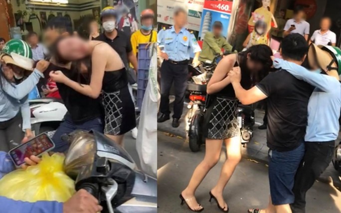 Người phụ nữ bị đánh ghen trên phố Lý Nam Đế. Ảnh cắt từ clip.
