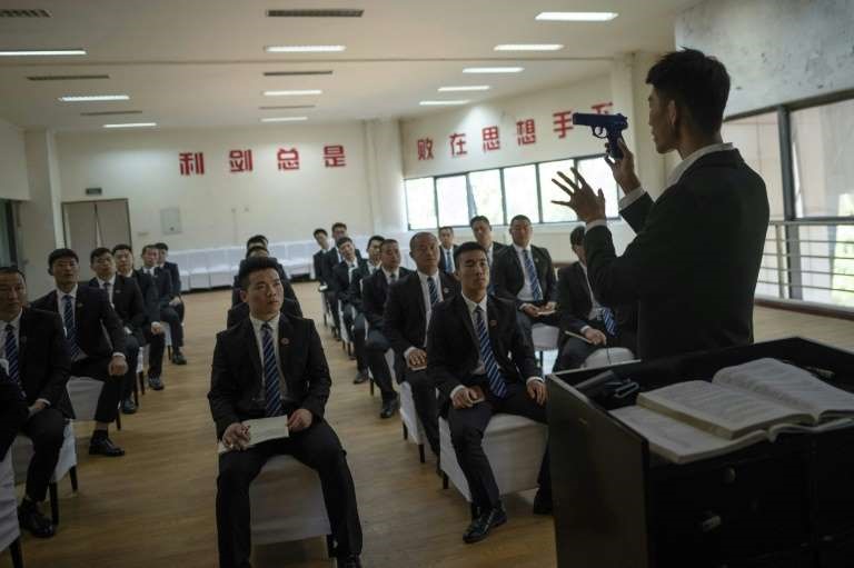 Mỗi năm có khoảng 1.000 học viên tốt nghiệp. Ảnh: WANG ZHAO/AFP