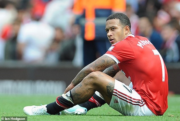 Depay từng lụi bại trong màu áo Manchester United. Ảnh: Getty.