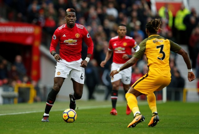 Pogba gặp khá nhiều bất lợi bởi lối chơi áp sát của đối thủ. Ảnh: Getty.