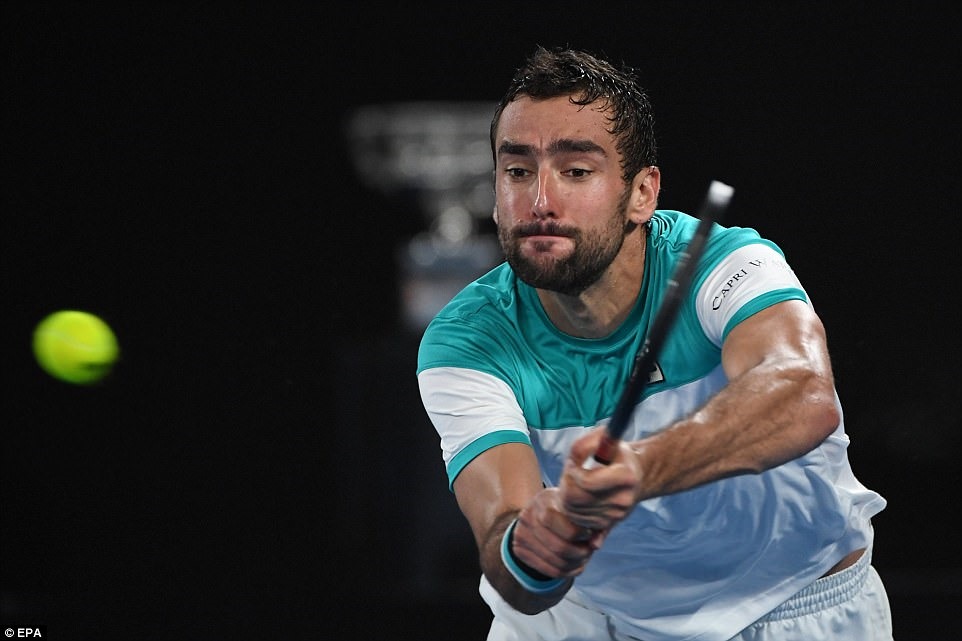Marin Cilic gây nhiều khó khăn cho Roger Federer. Ảnh: EPA.