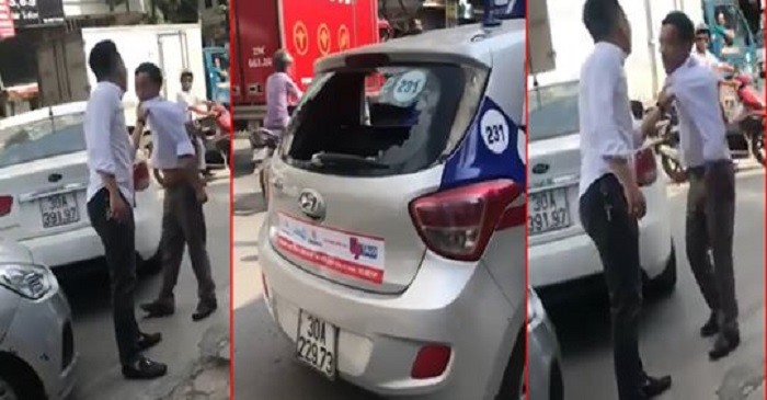 Nam thanh niên từ xe ô tô 4 chỗ hiệu KIA xuống xe, lớn tiếng chửi bới tài xế taxi sau va chạm xe. (Ảnh cắt từ clip)