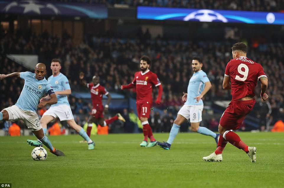 Firmino (số 9) ghi bàn thắng cuối của trận đấu. Ảnh: PA.