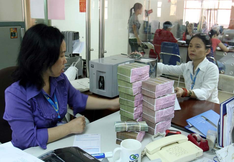 Hàng loạt ngân hàng báo lãi ngàn tỉ đồng ngay trong quý 1 năm nay. Ảnh: Ngọc Thắng
