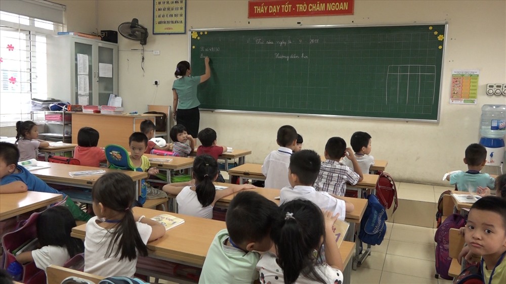Hành vi ứng xử đối với trẻ em phải mẫu mực, yêu thương, bao dung và trách nhiệm. Ảnh minh họa: Nguyễn Hà