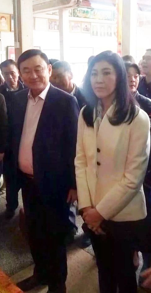 Anh em ông Thaksin-Yingluck đã xuất hiện tại Nhật Bản, Trung Quốc, Singapore trong năm 2018. Ảnh: SCMP.