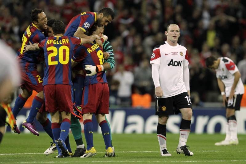 Lần thứ 2 Rooney và đồng đội gục ngã trong trận chung kết trước một Barca quá mạnh. Ảnh: Matt Dunham.