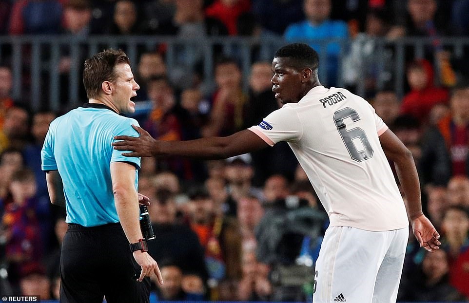 Pogba suýt nhận thẻ. Ảnh: Reuters.