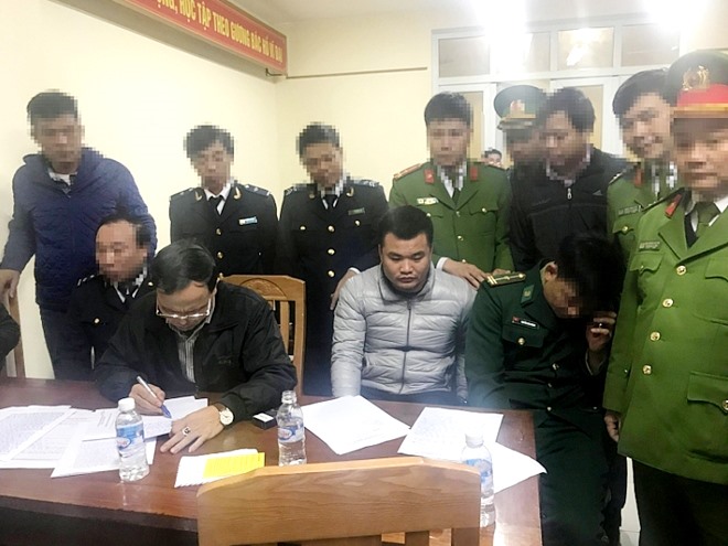 Các đối tượng bị bắt với tang vật là 120 bánh heroin vào ngày 23.1.2019