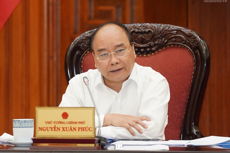 Thủ tướng Chính phủ Nguyễn Xuân Phúc chủ trì cuộc họp. Ảnh Quang Hiếu.